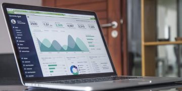 laptop measuring how PR drives sales growth